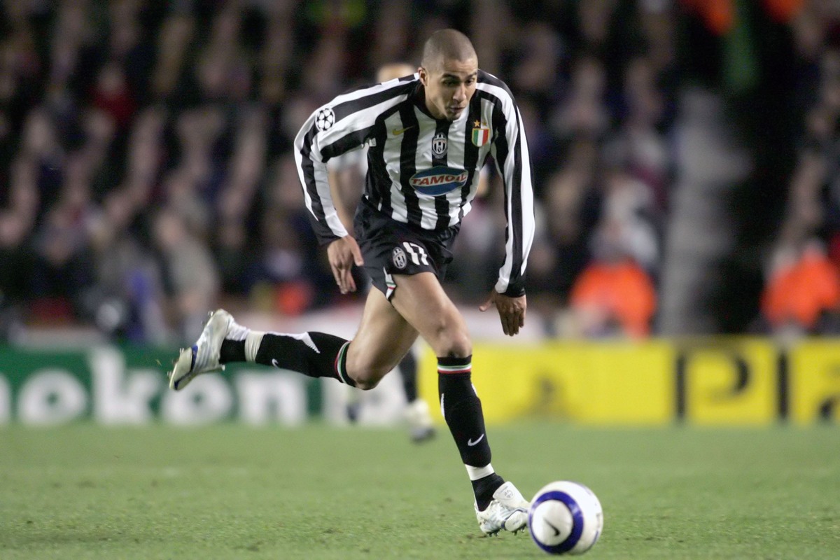 David Trezeguet, who has many UEFA goals, dribbles en route to the goal.