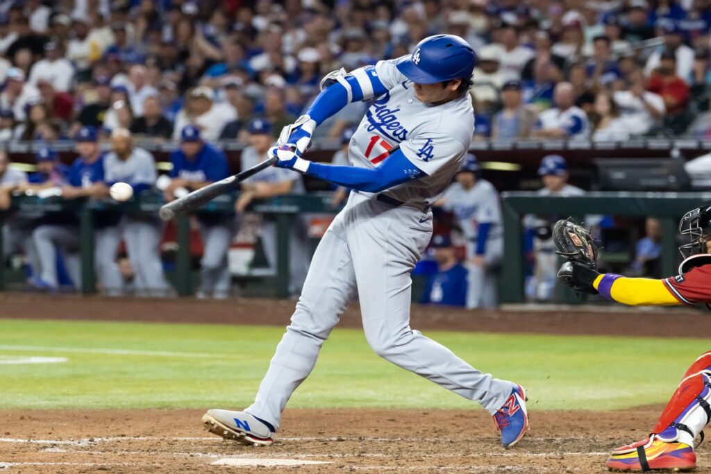 Potential Dodgers All-Star Shohei Ohtani hits a single.