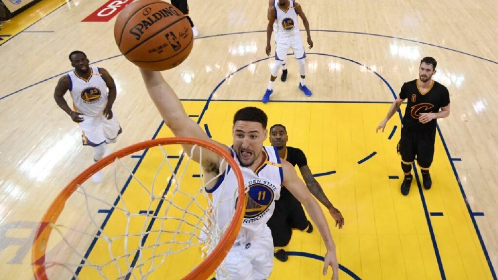 Golden State Warriors guard Klay Thompson (11) shoots against the Cleveland Cavaliers during the first half in game two of the 2017 NBA Finals at Oracle Arena.