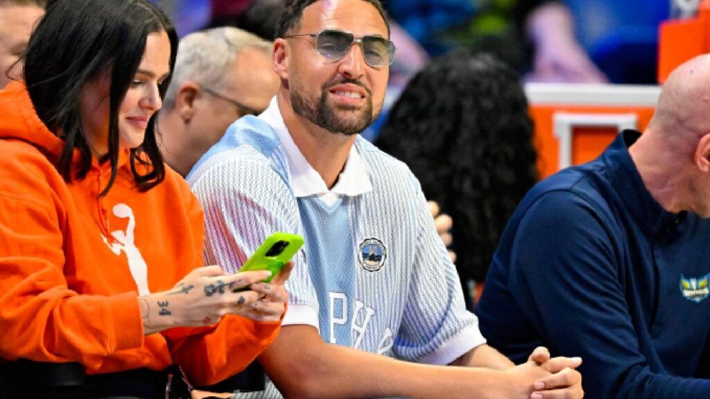 Dallas Mavericks guard Klay Thompson watches the game between the Dallas Wings and the Chicago Sky during the first half at College Park Center.