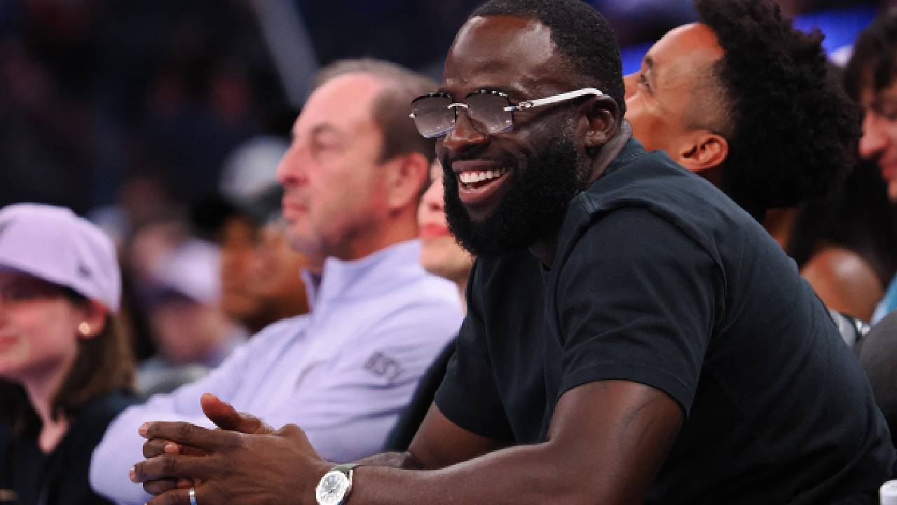 Golden State Warriors forward Draymond Green sits court side during the fourth quarter between the Golden State Valkyries and Toronto Tempo at Chase Center.