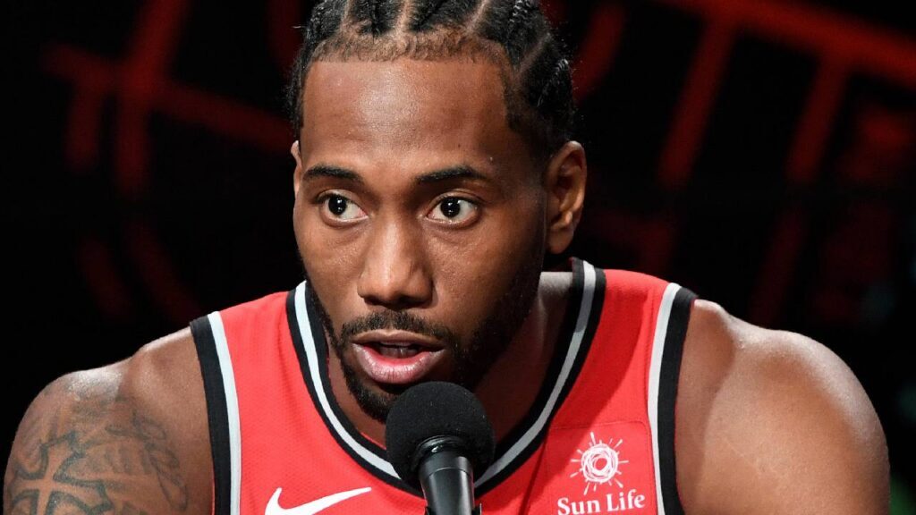 Kawhi Leonard answers questions during Toronto Raptors media day in Kawhi Leonard Contract Extension coverage.