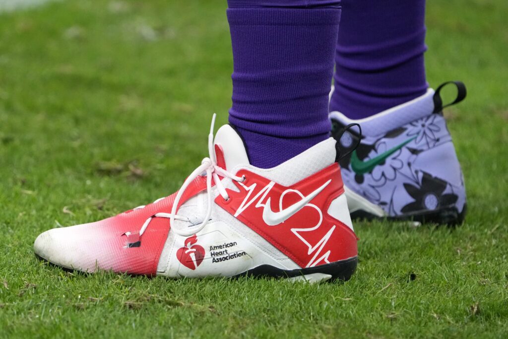 Vikings player wearing American Heart Association cleats for NFL Health awareness