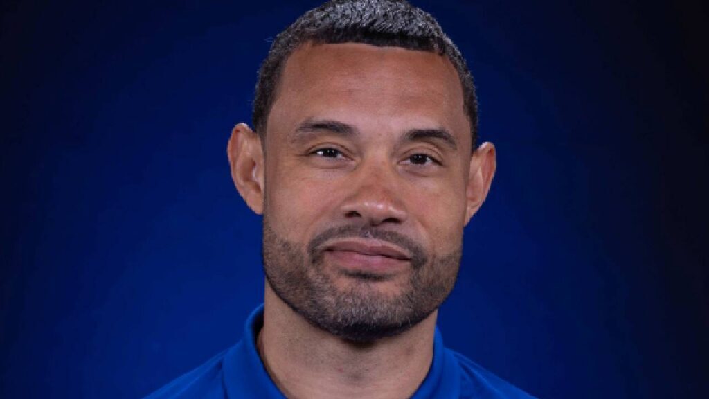 Trajan Langdon poses at Detroit Pistons media day in 2024 during Jalen Duren Contract Negotiations coverage