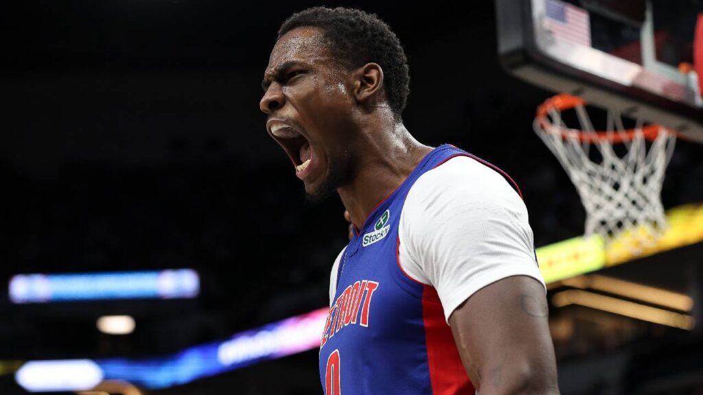 Jalen Duren celebrates a dunk against the Minnesota Timberwolves during a 2025 Pistons game amid Jalen Duren Contract Negotiations