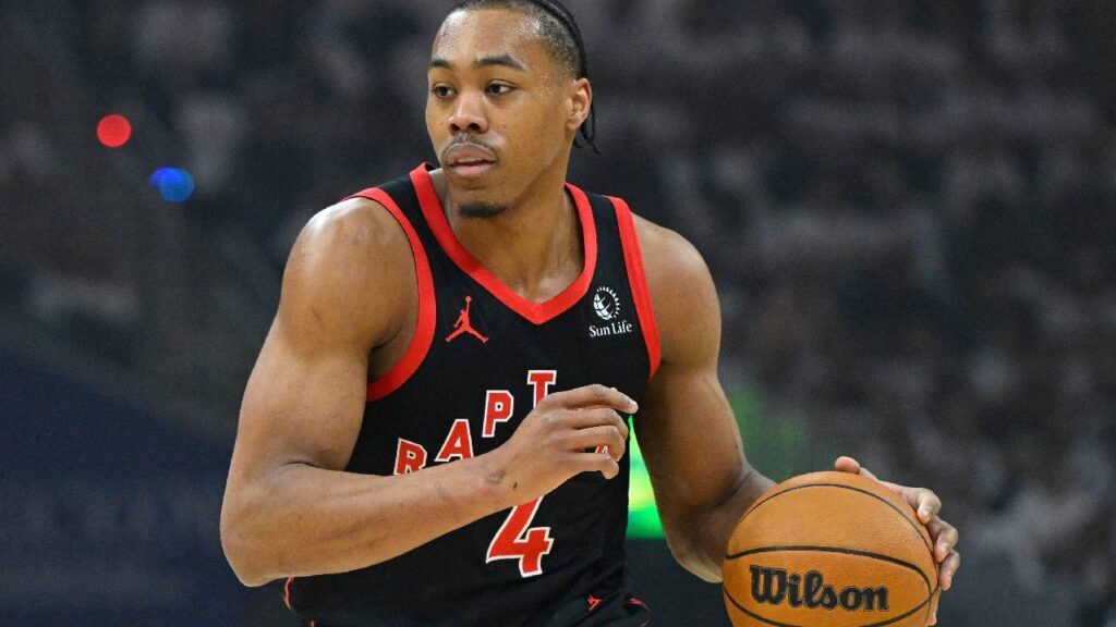 Scottie Barnes brings the ball up court against the Cleveland Cavaliers as the Toronto Raptors build around Kawhi Leonard Contract Extension plans.