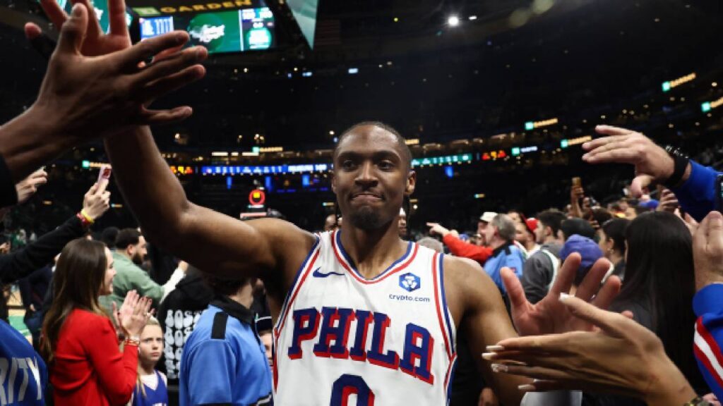 Philadelphia 76ers guard Tyrese Maxey (0) is congratulated by fans as he leaves the court after their win over the Boston Celtics in game seven of the first round of the 2026 NBA Playoffs at TD Garden.