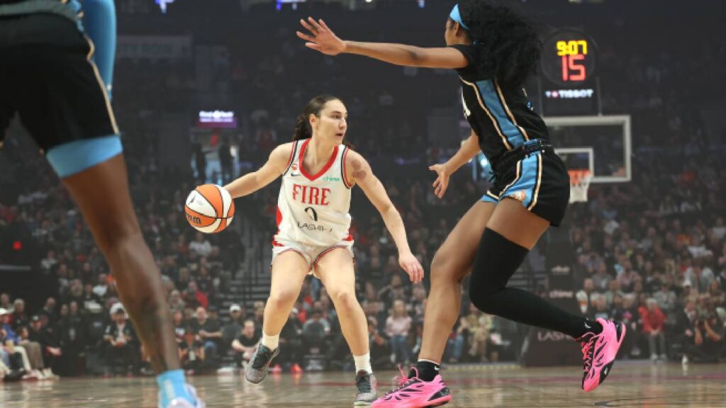 Angel Reese defends Portland Fire guard Carla Leite during a previous Atlanta Dream-Portland Fire matchup.
