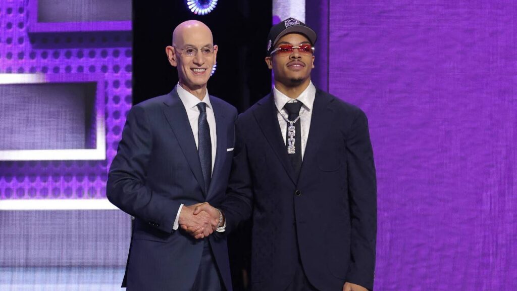 NBA commissioner Adam Silver greets the seventh pick in the 2026 NBA draft, Arkansas guard Darius Acuff Jr. after he was selected by the Sacramento Kings at Barclays Center. 
