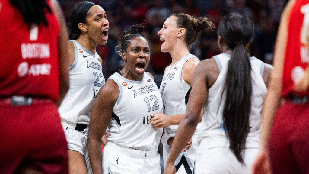 Chelsea Gray celebrates with Las Vegas Aces teammates after hitting a game-tying 3-pointer against Caitlin Clark and the Indiana Fever on Aug. 6, 2026, at Gainbridge Fieldhouse.