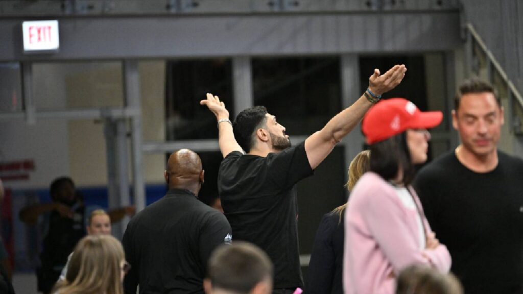 Turkish-American former basketball player and human rights activist Enes Kanter Freedom is removed from the arena during the second half against the Indiana Fever at Wintrust Arena.
