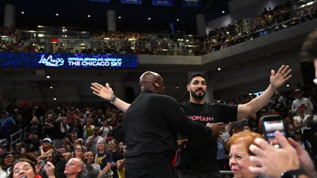 Turkish-American former basketball player and human rights activist Enes Kanter Freedom reacts as he is removed from the arena during the second half against the Indiana Fever at Wintrust Arena.