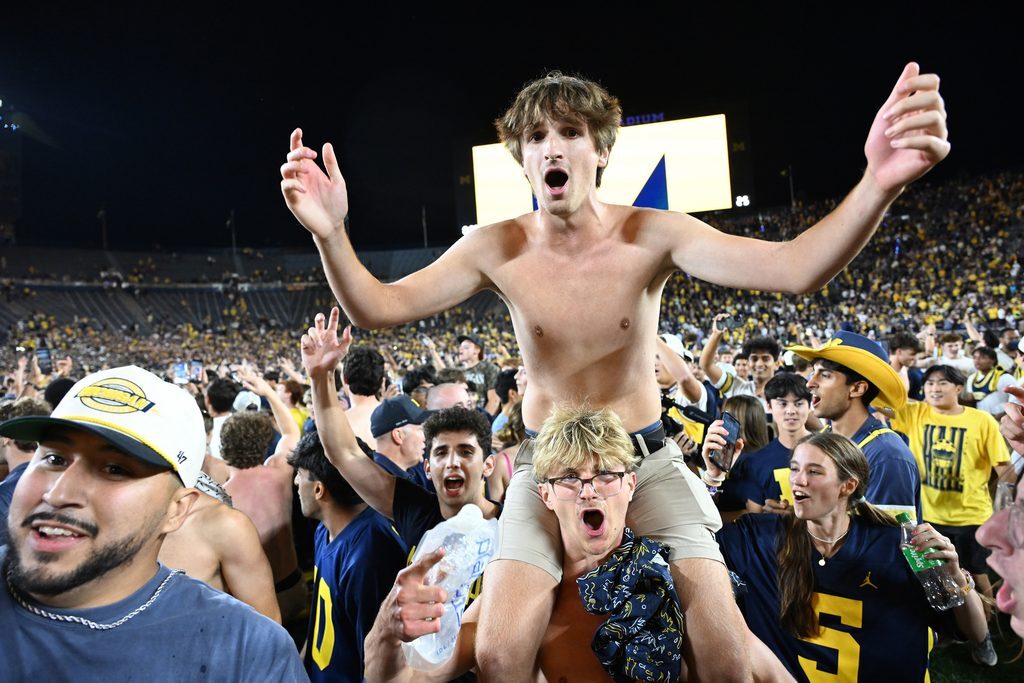 AP Top 25 Michigan fans storm field