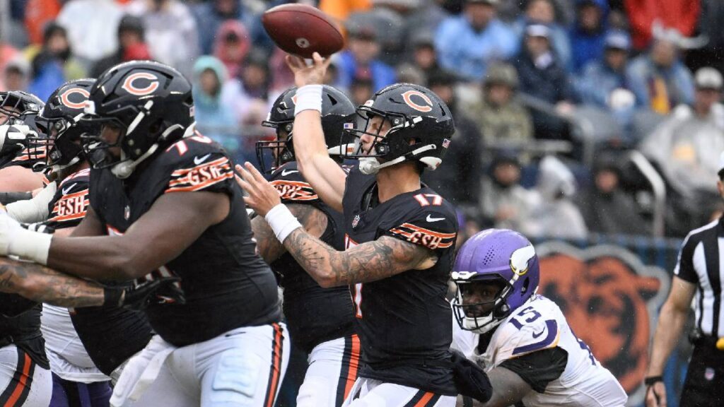Chicago Bears quarterback Tyson Bagent (17) throws a pass against Minnesota Vikings linebacker Dallas Turner (15) during the fourth quarter at Soldier Field after the Caleb Williams Injury update.