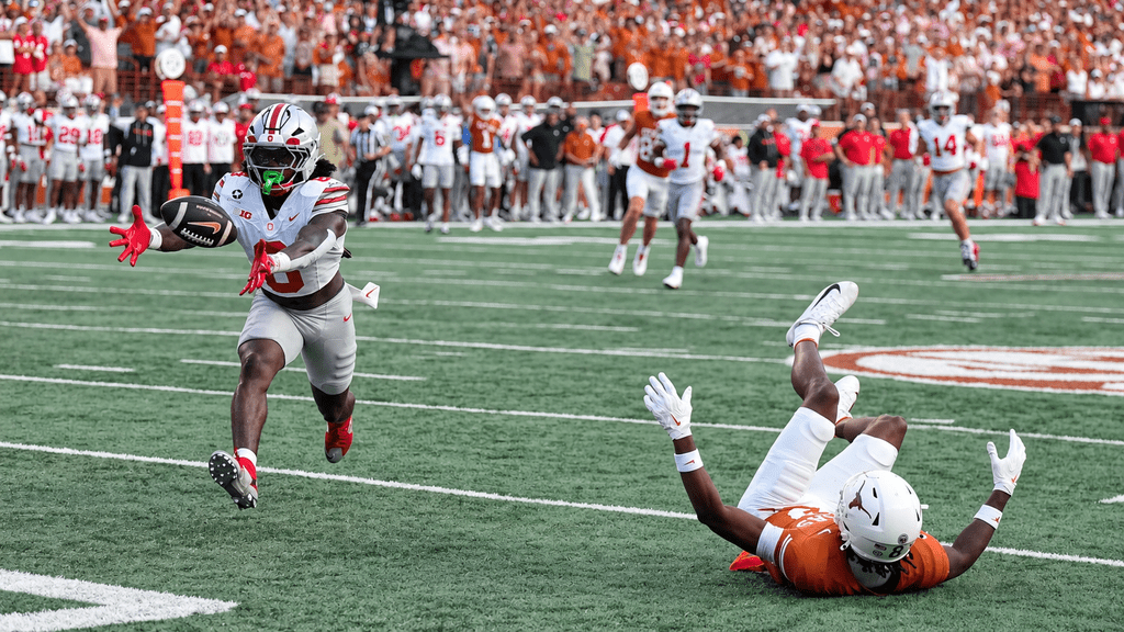 Ohio State player intercepts pass during Texas vs Ohio State