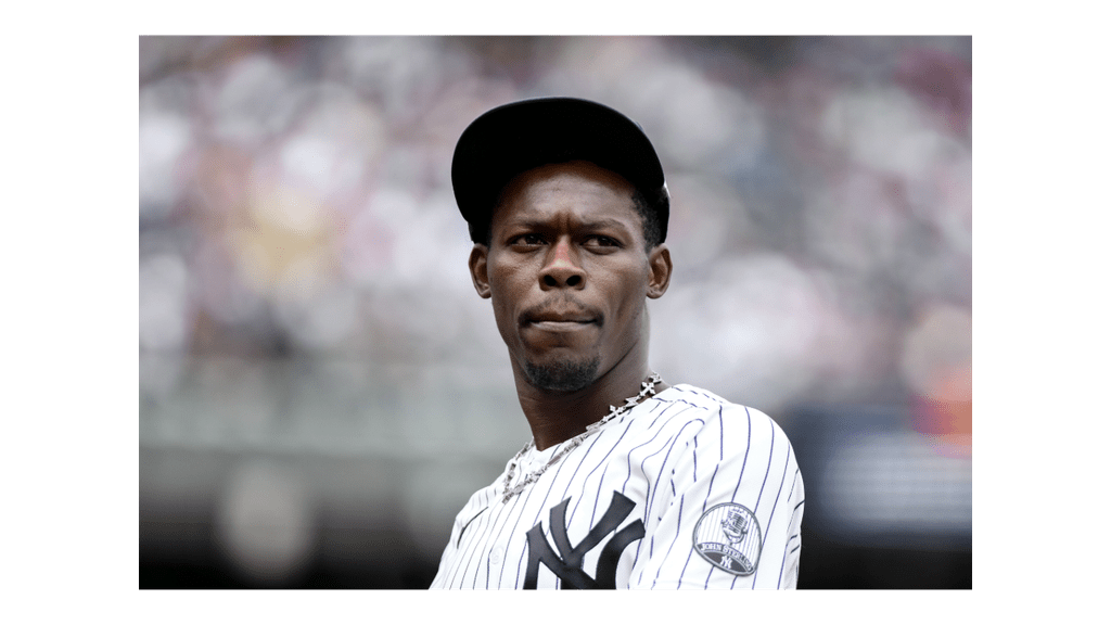 Jazz Chisholm Jr. walking to the Yankees dugout