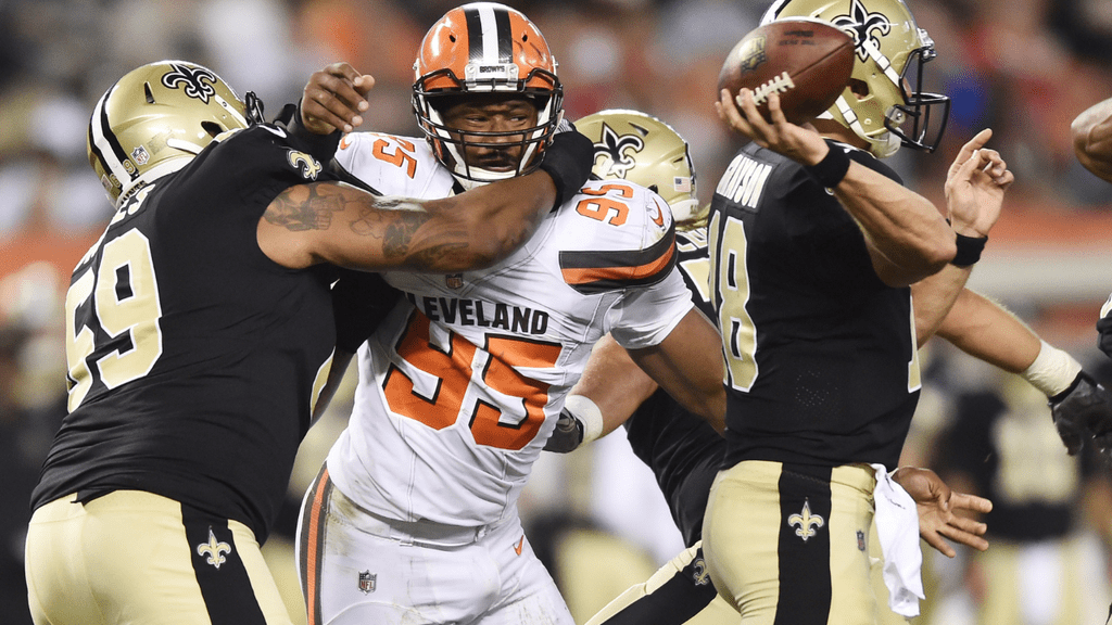 Aug 10, 2017; Cleveland, OH, USA; Cleveland Browns defensive end Myles Garrett (95) rushes past the block of New Orleans Saints offensive tackle Khalif Barnes (69) as New Orleans Saints quarterback Garrett Grayson (18) throws a pass during the first half at FirstEnergy Stadium. Mandatory Credit: Ken Blaze-USA TODAY Sports