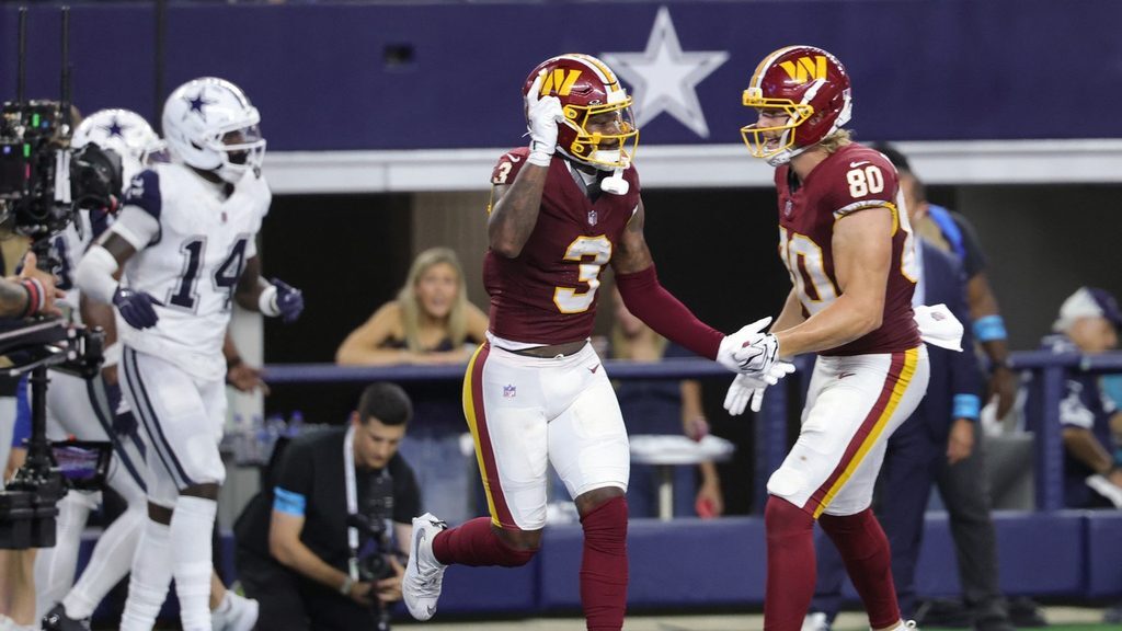Marcus Mariota plays quarterback for Commanders against Cowboys