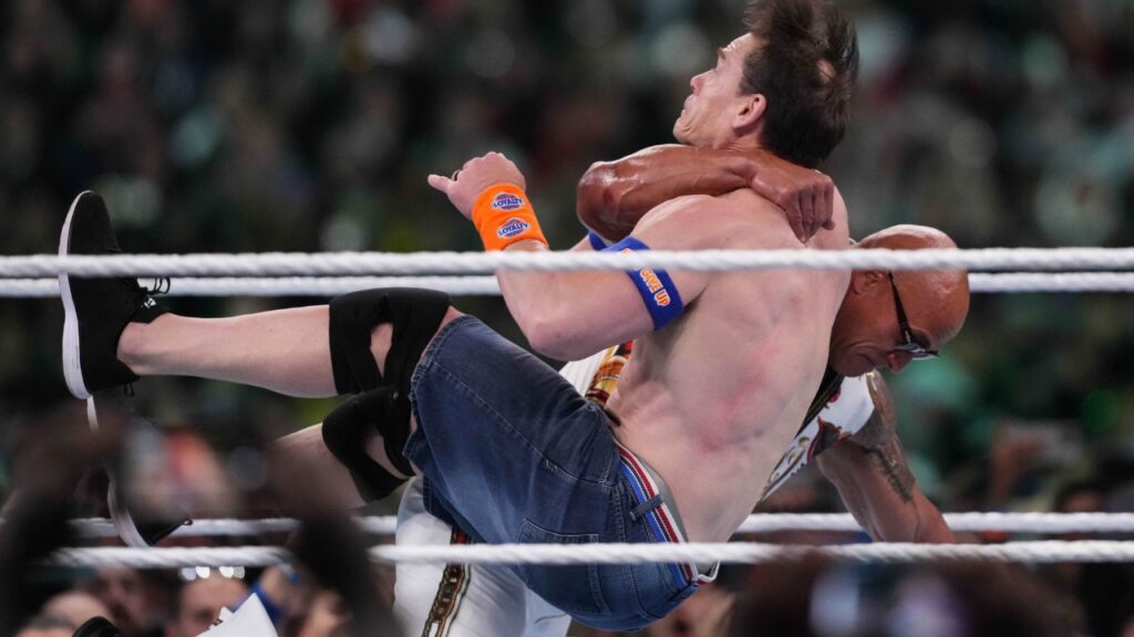 The Rock performing inside of a WWE ring