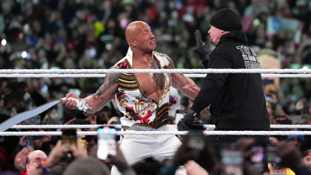 The Rock performing inside of a WWE ring