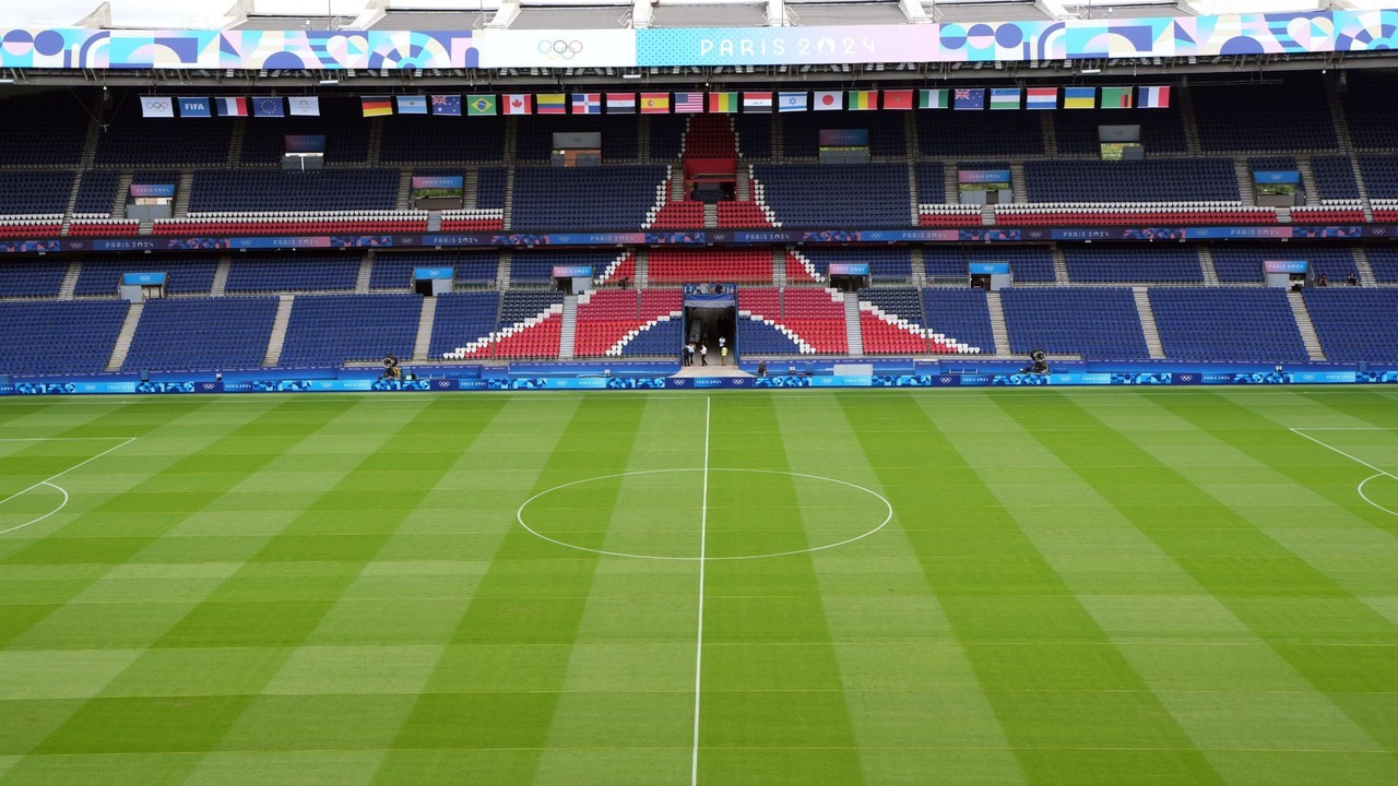 PSG and Barcelona players compete in a Champions League match