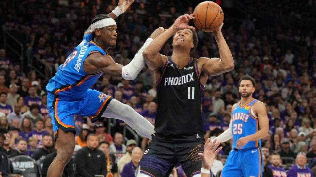 Oso Ighodaro drives against Shai Gilgeous-Alexander as Phoenix Suns Training Camp begins the battle for the starting center role.