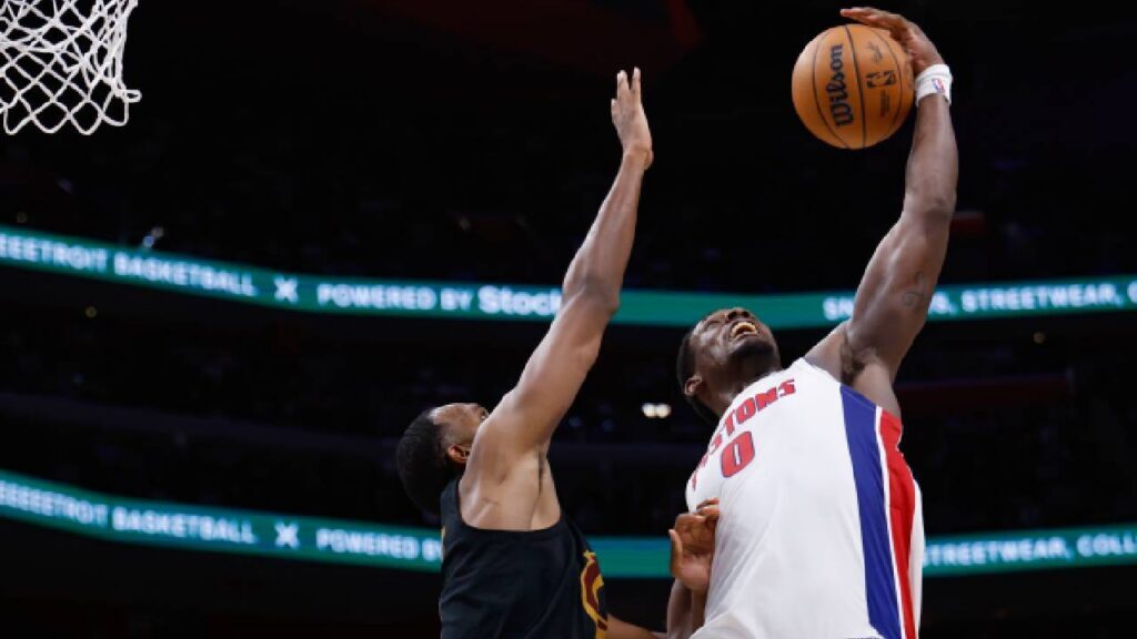 Jalen Duren grabs a rebound against Evan Mobley during Pistons playoff game, highlighting Jalen Duren Contract Extension