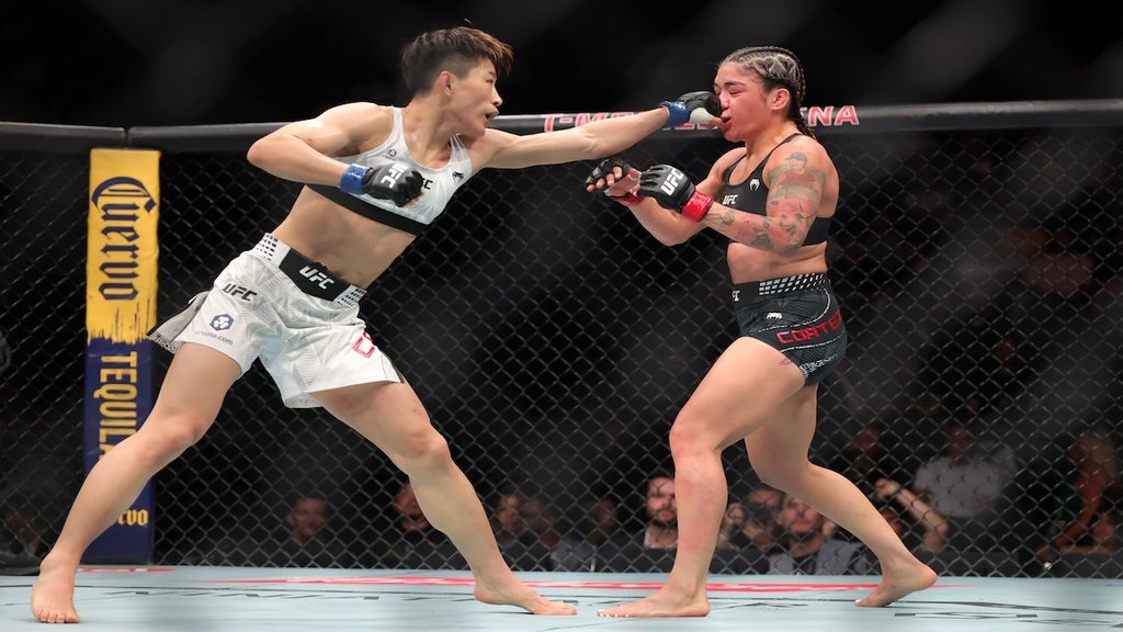 UFC 332: Wang Cong throws a left jab