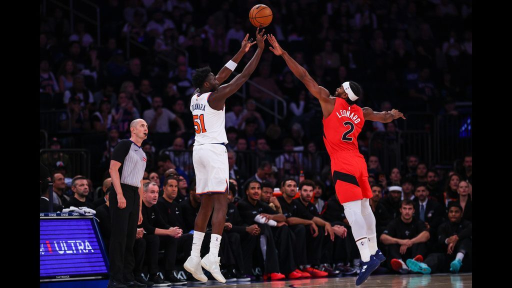 Mohamed Diawara shoots a three over Kawhi Leonard in the preseason