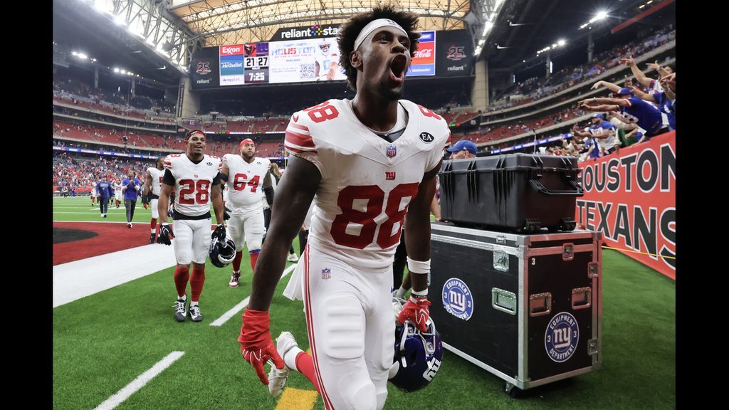 Malachi Fields celebrates the Giants win over the Texans