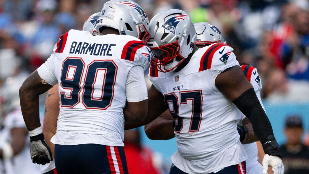 Patriots vs. Bears: Milton Williams and Christian Barmore celebrating after a play.