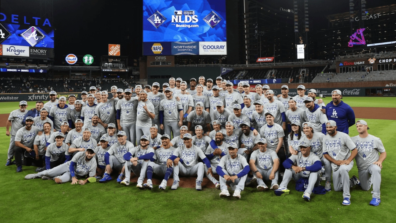 Oct 7, 2026; Cumberland, Georgia, USA; The Los Angeles Dodgers pose on the field after defeating the Atlanta Braves in game four of the NLDS for the 2026 MLB Playoffs at Truist Park. Mandatory Credit: Brett Davis-Imagn Images