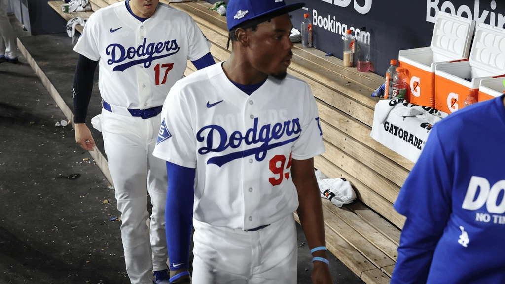 Oct 4, 2026; Los Angeles, California, USA; Los Angeles Dodgers pitcher Shohei Ohtani (17) and outfielder Josue De Paula (95) leave the dugout after losing game two of the NLDS for the 2026 MLB Playoffs to the Atlanta Braves at Uniqlo Field at Dodger Stadium. Mandatory Credit: Kiyoshi Mio-Imagn Images
