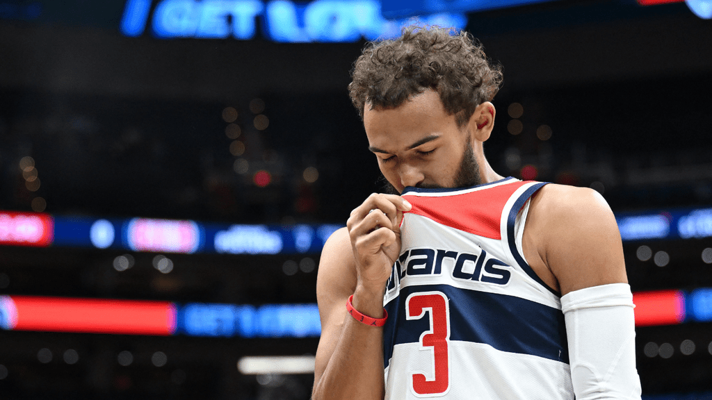 Oct 10, 2026; Washington, District of Columbia, USA; Washington Wizards guard Trae Young (3) kisses his jersey before the first quarter against the Detroit Pistons at Capital One Arena. Mandatory Credit: Rafael Suanes-Imagn Images. Wizards.
