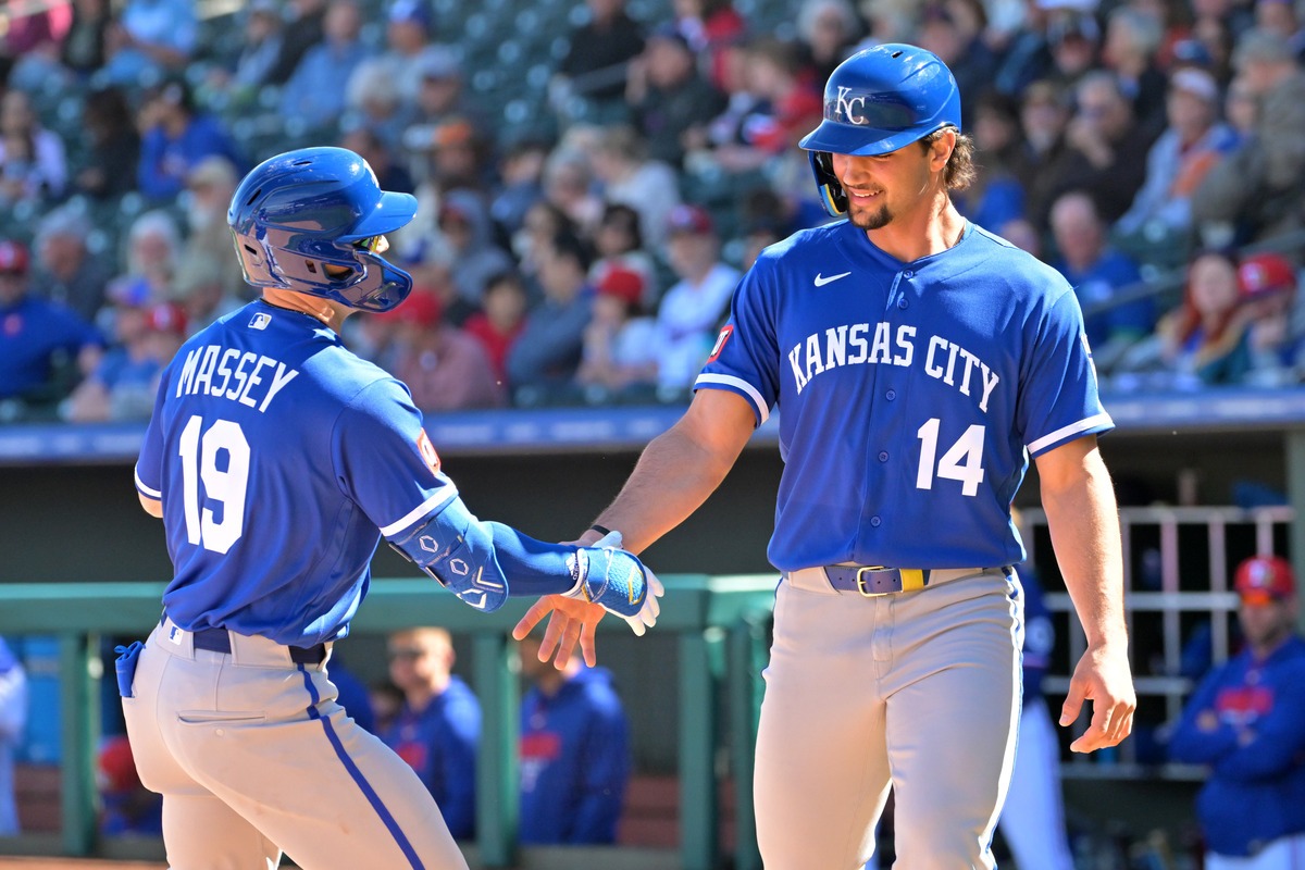 Kansas City Royals players celebrate a Spring Training home run.