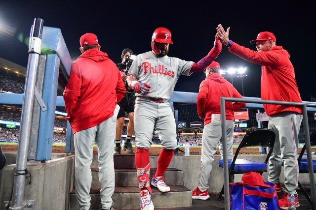 Potential NL MVP candidate Kyle Schwarber celebrates after hitting a home run.