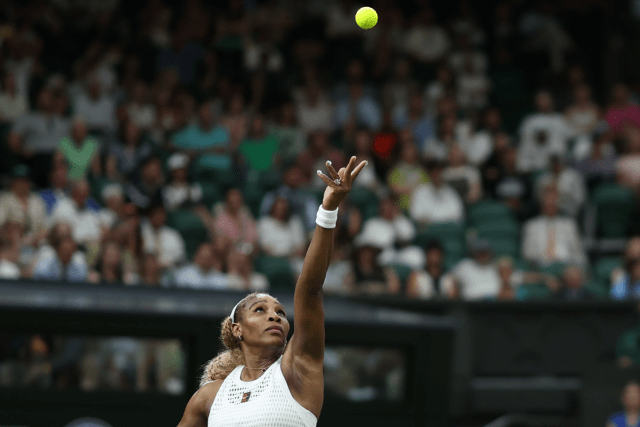 Serena Williams serves at Wimbledon.