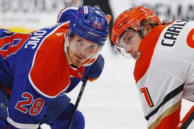Leo Carlsson takes a face-off. 