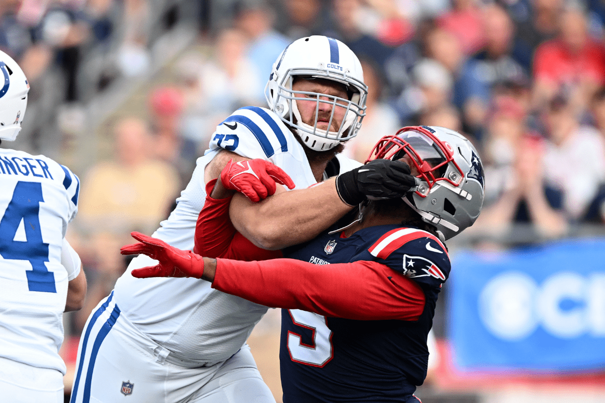 Nov 6, 2022; Foxborough, Massachusetts, USA; Indianapolis Colts offensive tackle Braden Smith (72) draws a holding penalty during a play against New England Patriots linebacker Matthew Judon (9) during the first half at Gillette Stadium. Mandatory Credit: Brian Fluharty-Imagn Images