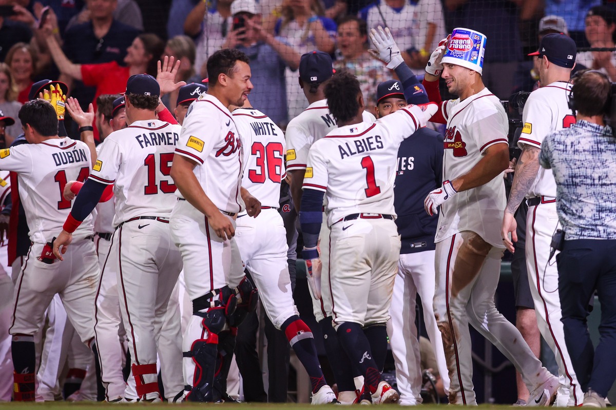 The Atlanta Braves celebrate a walk-off win.