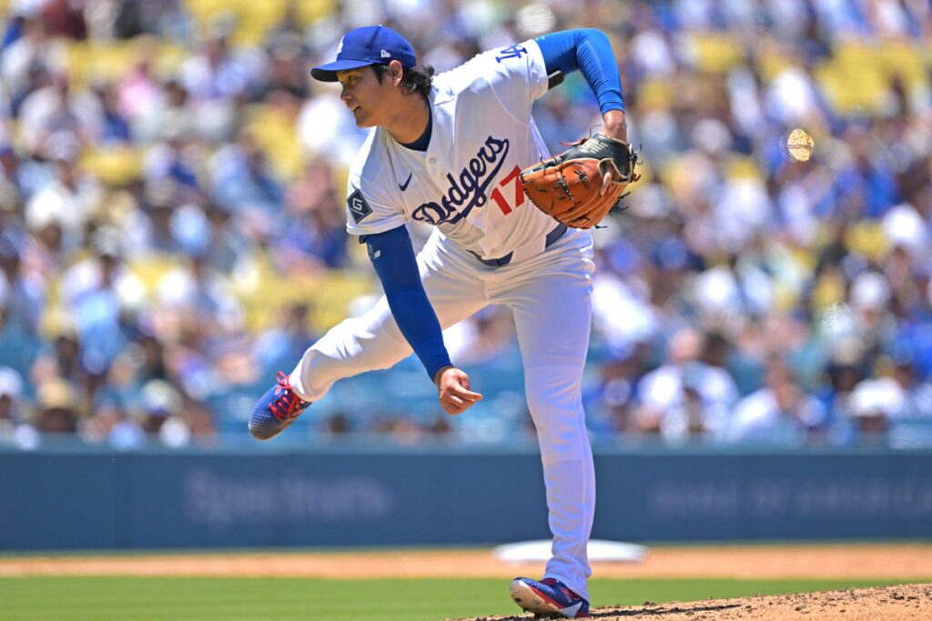 Shohei Ohtani throws a pitch.