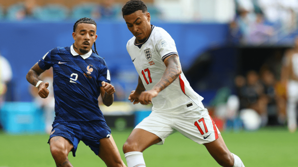 Soccer Football - FIFA World Cup 2026 - Bronze Final - France v England - Miami Stadium, Miami Gardens, Florida, U.S. - July 18, 2026 England's Morgan Rogers in action with France's Malo Gusto IMAGN IMAGES via Reuters/Nathan Ray Seebeck
