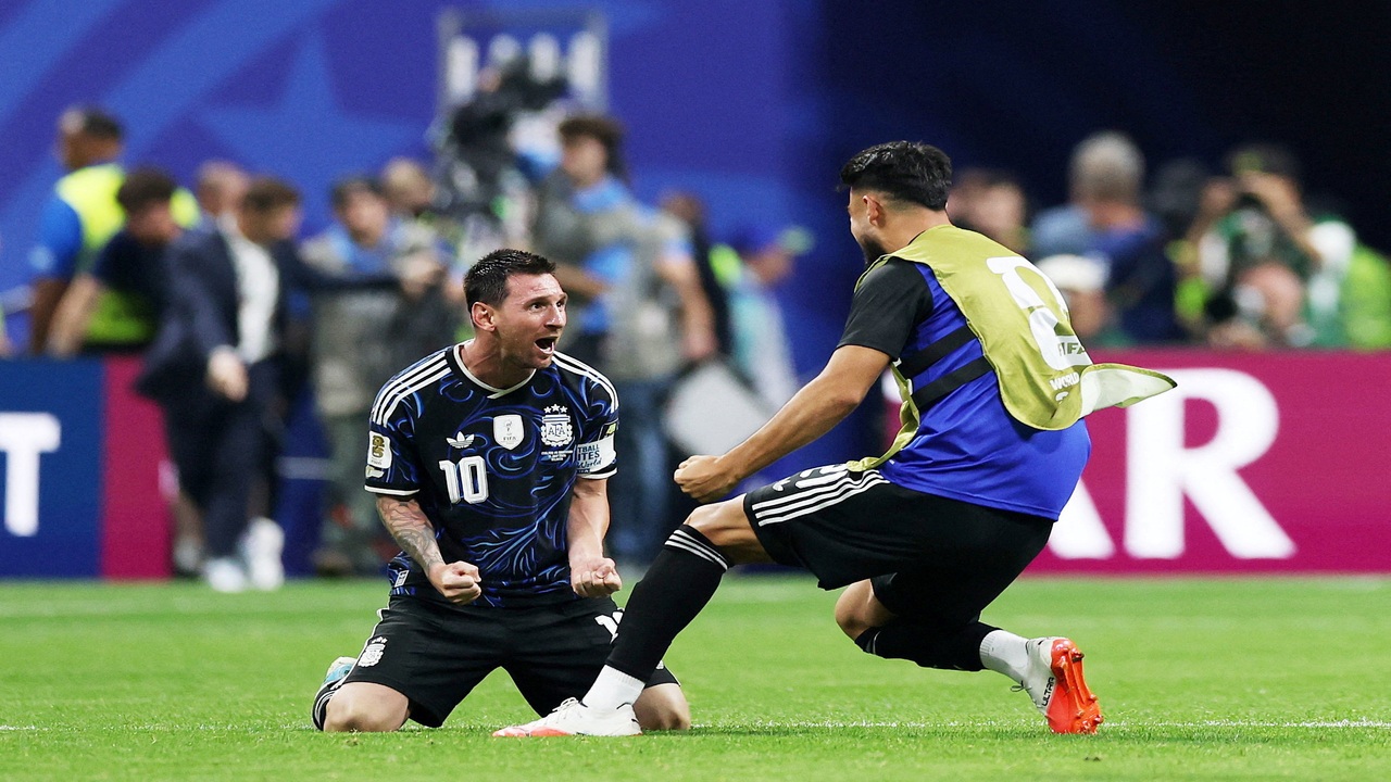 Lionel Messi celebrates winning the Argentina vs England game.