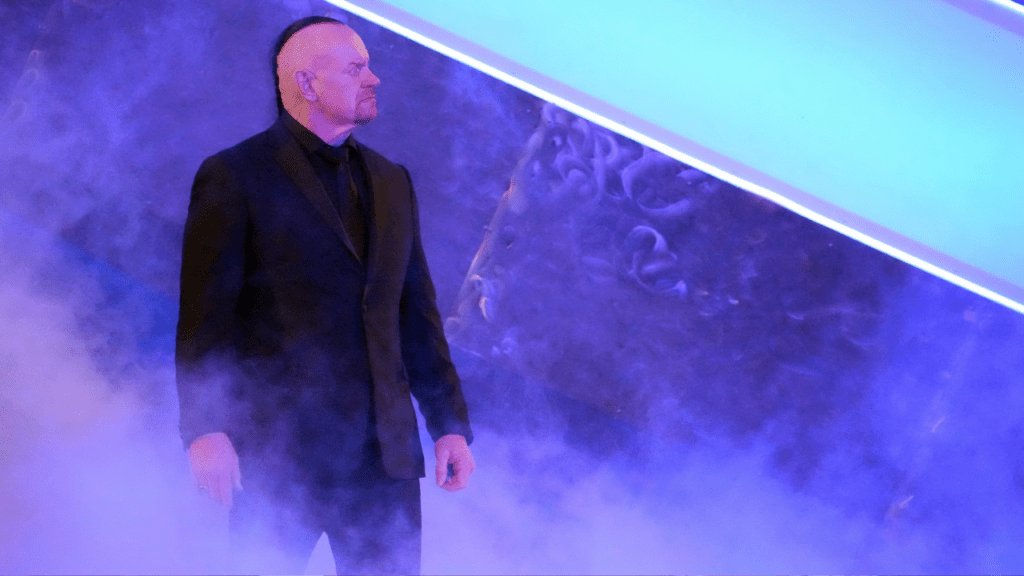 The Undertaker enters an arena. 