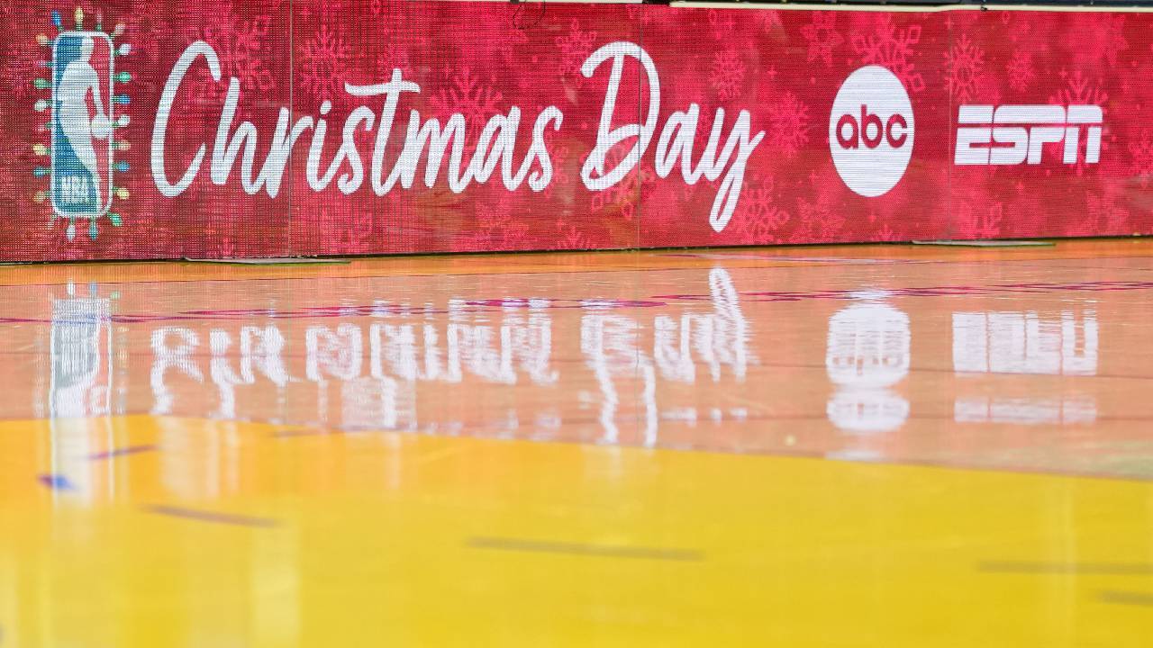 A courtside message board displays the NBA logo for Christmas before the game between the Golden State Warriors and the Dallas Mavericks at Chase Center.