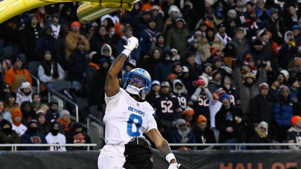 Detroit Lions running back Jahmyr Gibbs (0) celebrates after scoring a touchdown against the Chicago Bears during the first half at Soldier Field.