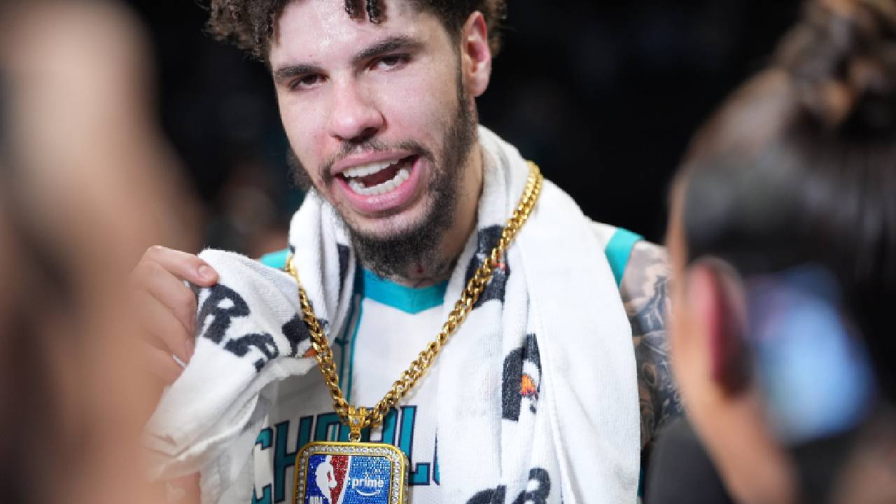 Former Charlotte Hornets guard LaMelo Ball (1) is given a prime award after the second half overtime win during the play-in rounds between the Charlotte Hornets and the Miami Heat of the 2026 NBA Playoffs at Spectrum Center.