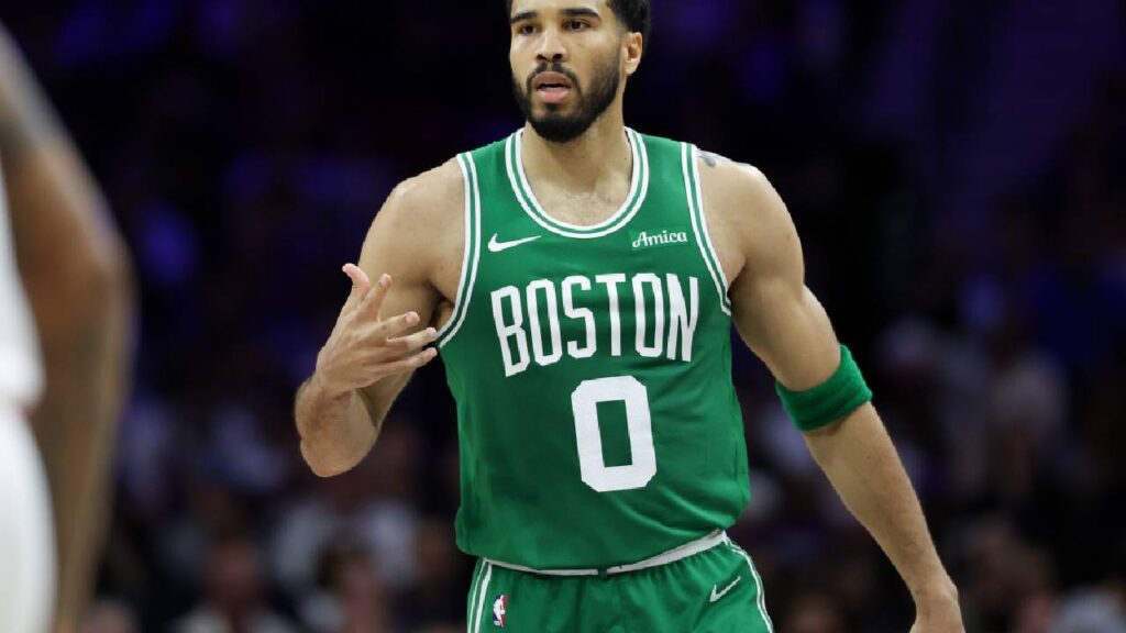 Boston Celtics forward Jayson Tatum (0) reacts to his score against the Philadelphia 76ers during the second quarter at Xfinity Mobile Arena.