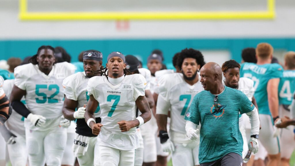 Aug 3, 2026; Miami Gardens, FL, USA; Miami Dolphins wide receiver Caleb Douglas (7) runs on the field during practice at Baptist Health Training Complex. Mandatory Credit: Sam Navarro-Imagn Images

