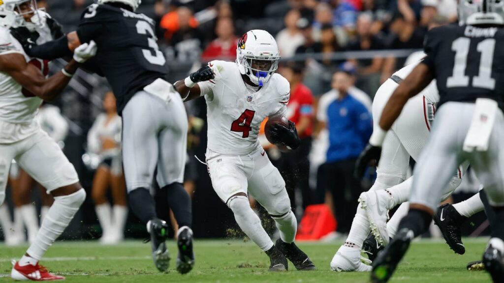 Arizona Cardinals running back Jeremiyah Love (4) runs during a preseason game against the Las Vegas Raiders at Allegiant Stadium.
